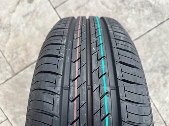 Plechový disk s pneu Bridgestone 5x112 195/65/R15 - 2