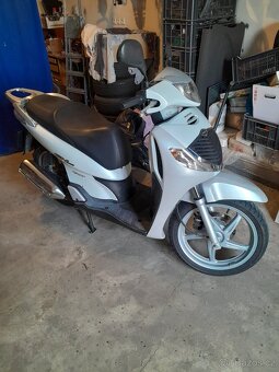 Original plexi a kufr honda sh 125 - 2
