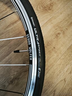 Přední kolo Yedoo Wolfer 28" NOVATEC & Continental - 2