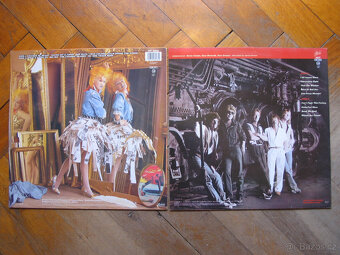 LP vinyly = CYNDI LAUPER + REO SPEEDWAGON. - 2