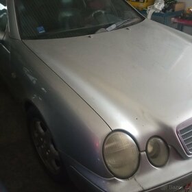 E 210 - 2
