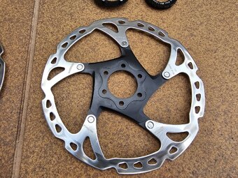 2x kotouče SHIMANO XT SM-RT76 - 180mm - 6 děr/CL - 2