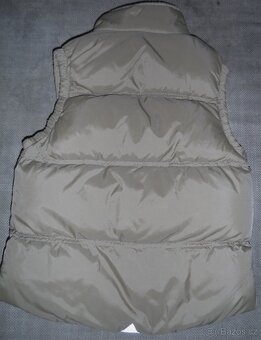 Teplá vesta vel. 134 - 2