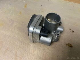 škrtící klapka originál Škoda 036133062N 1.2 HTP 1.4 16V - 2