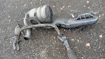 Man tgl zadní drzak - 2