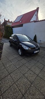 Mazda 2,1,3 63 kw - 2