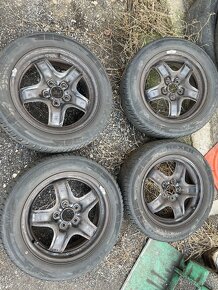 Disky Ford-5x108, celoroční pneu Nexen, 205/55 R16 - 2