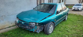 Havarovaný Nissan Primera 1995 - 2