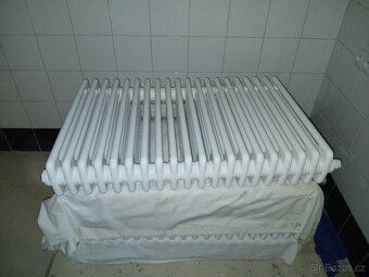 Litinový radiátor nová, 20článek,K dispozici 4 baterie. Cena - 2