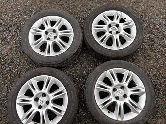 Alu orig letni sada Opel 4x100 6,5J ET40 195/55 R16 - 2
