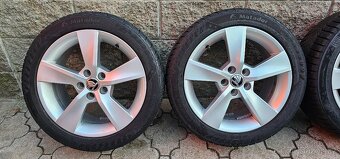 Originál alu Škoda Rapid 5x100 215/45 R16 - zimní 8mm - 2