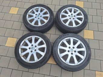 Originální sada alu disků včetně zimních pneu Octávie II - 2