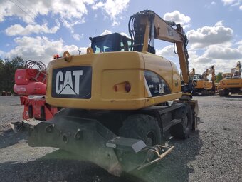 Kolový otočný bagr CAT 313D - 2