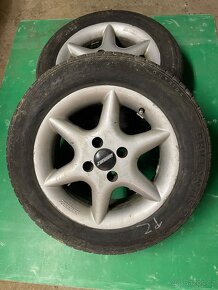 Hliníková kola na Kia Rio, škoda KBA 42 888, 6Jx14 H2,03604A - 2