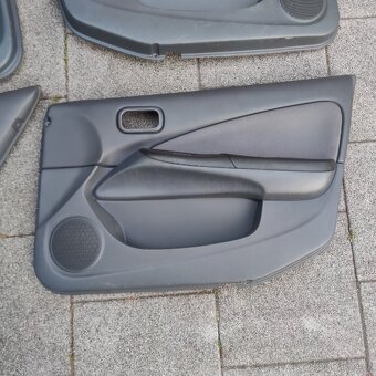 Komplet čalounění dveří Nissan Almera N16 sedan - 2