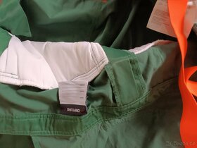 Kalhoty pracovní, protipořezové ve vel. 52 a 56 - 2
