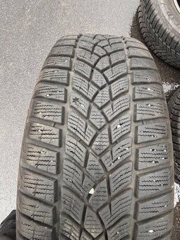 Alu kola z VW Tiguan 215/65/16 Good Year Zimní 7 mm - 2