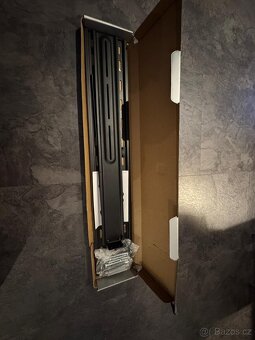 Držák na TV- nový - 2