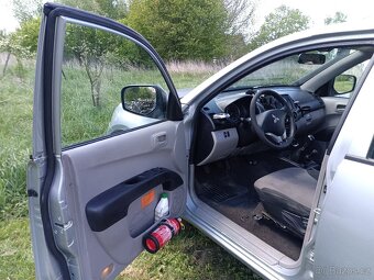 Mitsubishi L200 r.2011 - 2