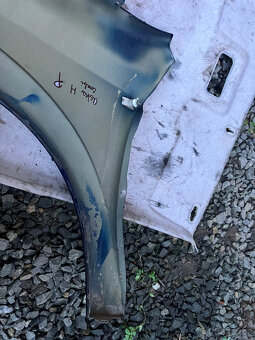 Pravý blatník Opel Astra H - 2