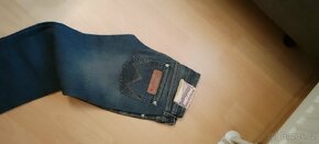 Džíny Wrangler nové - 2