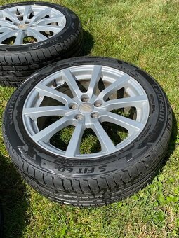 Orig Subaru 17" disky s novými pneu 215/50 - 2