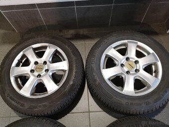 Ford Focus Cmax alu 15 + celoroční 195/65/15. - 2