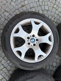 Litá kola BMW 5x120 R19 s letními pneu 255/50 a 285/45 R19 - 2