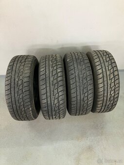 Zimní pneu 235/60/R16 H + plech.disky - 2