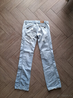 Světle modré džíny vel. S-M - 2