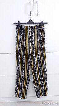 Dívči kalhoty 134/140 na 9/10 let - 2