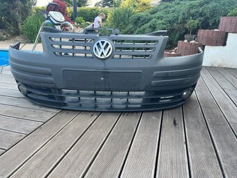 Nárazník Vw Caddy s předními světly - 2