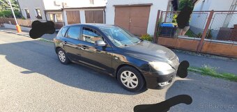 Mazda 3 nafta 1,6 rok 2006 - 2