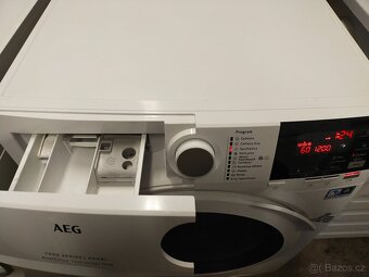 Prodám pračku se sušičkou značky AEG 7/4kg--- Dovezu 7/4 - 2
