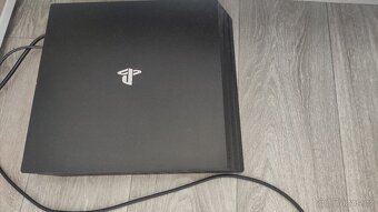 PS4 Pro 1tB - 2