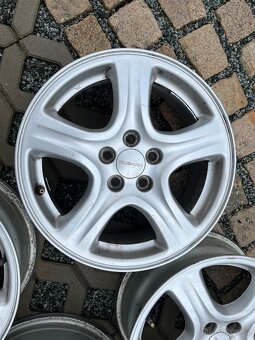 4x litá kola 5x100 R16 - Subaru - 2