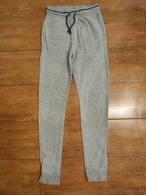 Tepláky chlapecké v perfektním stavu.Velikost 158/164 - 2