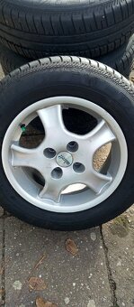 Alu kola 7jx15 H2 ET35 s pneu. - 2