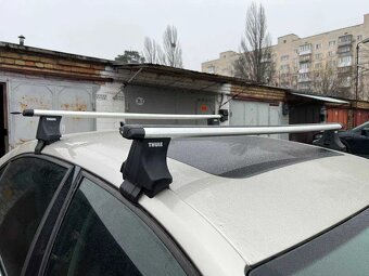 Střešní nosič Thule VW Jetta 4dv. sedan (MK5) 2005-10 - 2