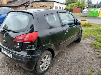 Prodám bourané Mitsubishi Colt 1.1. z roku 2009 - 2