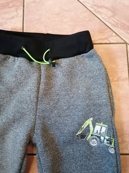 Chlapecké, zateplené kalhoty vel. 98-104 zn. Kugo - 2