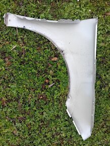 Levý přední blatník na Škoda KAMIQ - 2