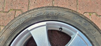 Alu kolo originál Škoda Octavia 5x112 6,5x16 ET50 205/55r16 - 2