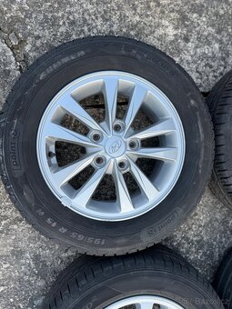 Alu kola Hyundai 5x114,3 R15 včetně pneu 195/65/15 - 2