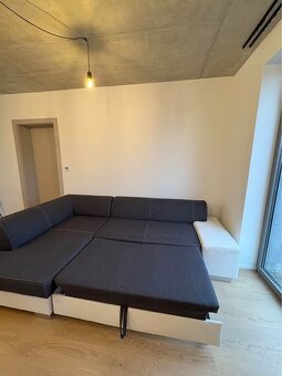 Rohová sedačka/pohovka s úložným prostorem a rozkladem na lů - 2