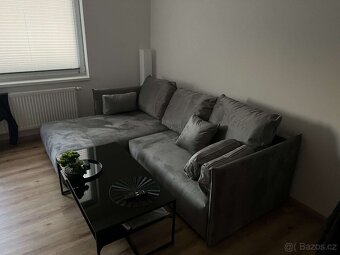 Krásná rozkládací sedačka s úložným prostorem - 2