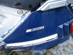 skutr honda - 2