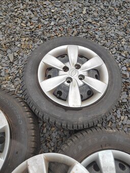 Prodám zimní kolo 14 kia Rio 4x100 zimní pneu 185/65/14 - 2