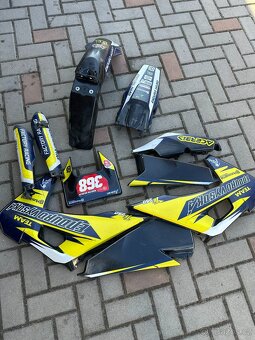 plasty Husqvarna 250i - 2