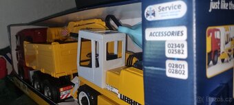 Bruder Nákladní auto MAN TGA s bagrem Liebherr, 1:16 - 2